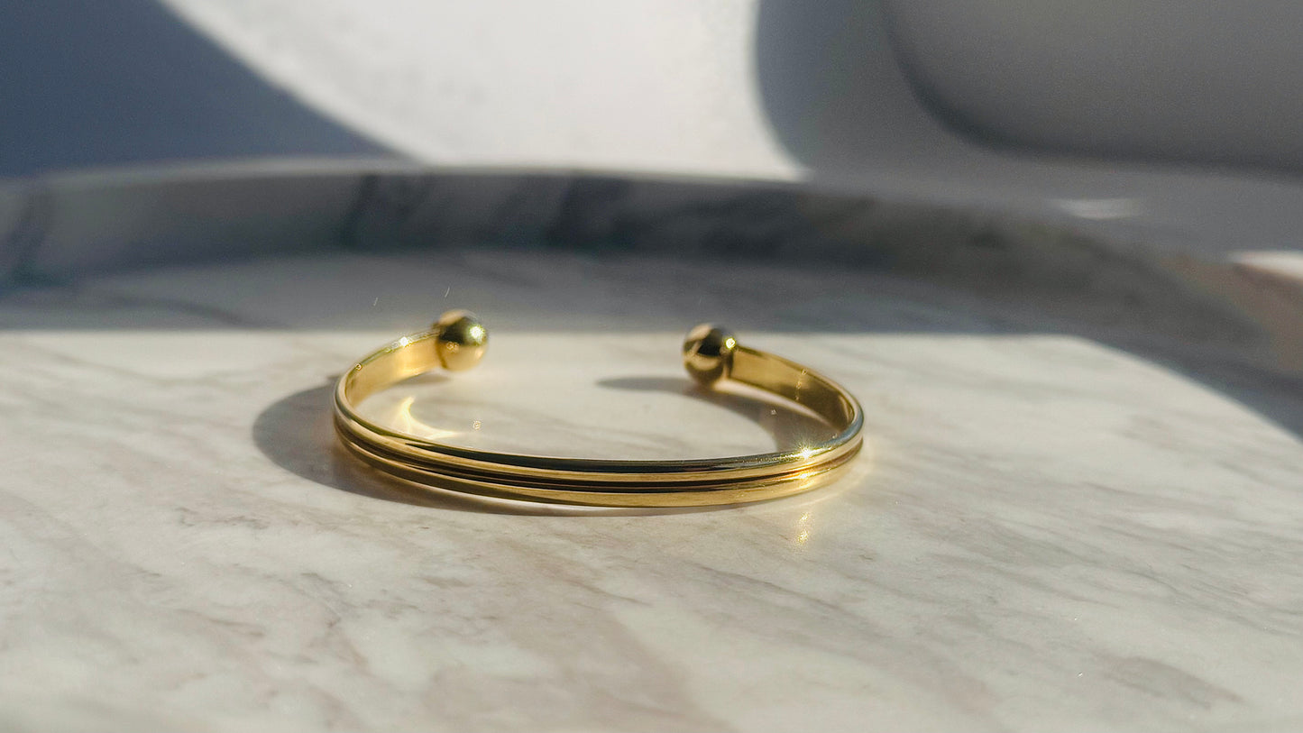 9 Carat Gold 'Torque' Bangle